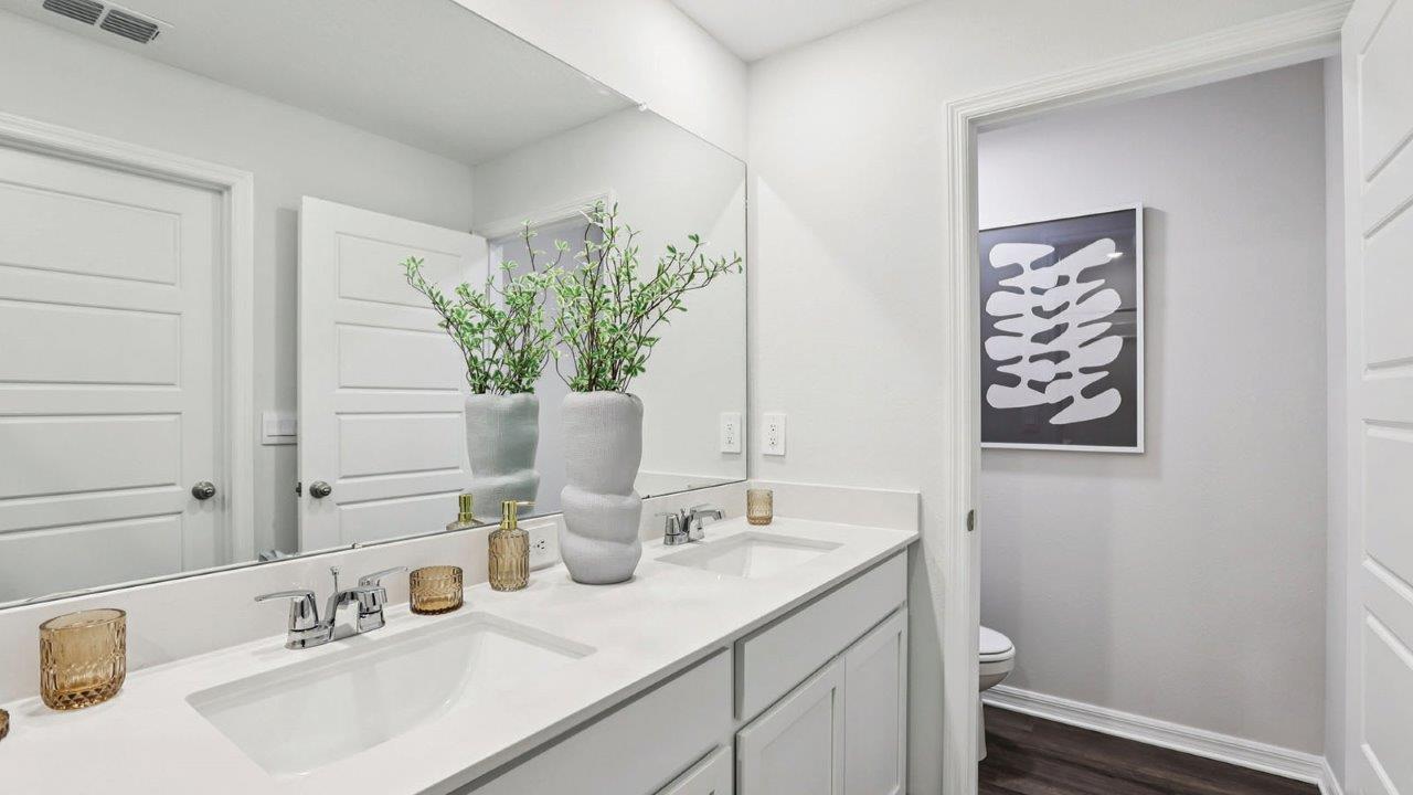Primary bathroom with dual vanity sink