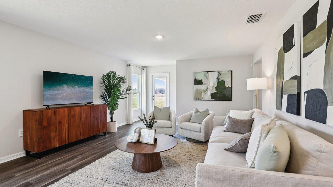 Living room with view of back patio