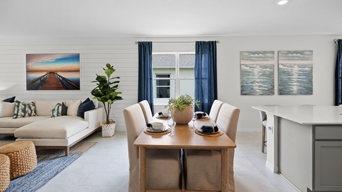 Dining area with ceramic tile flooring
