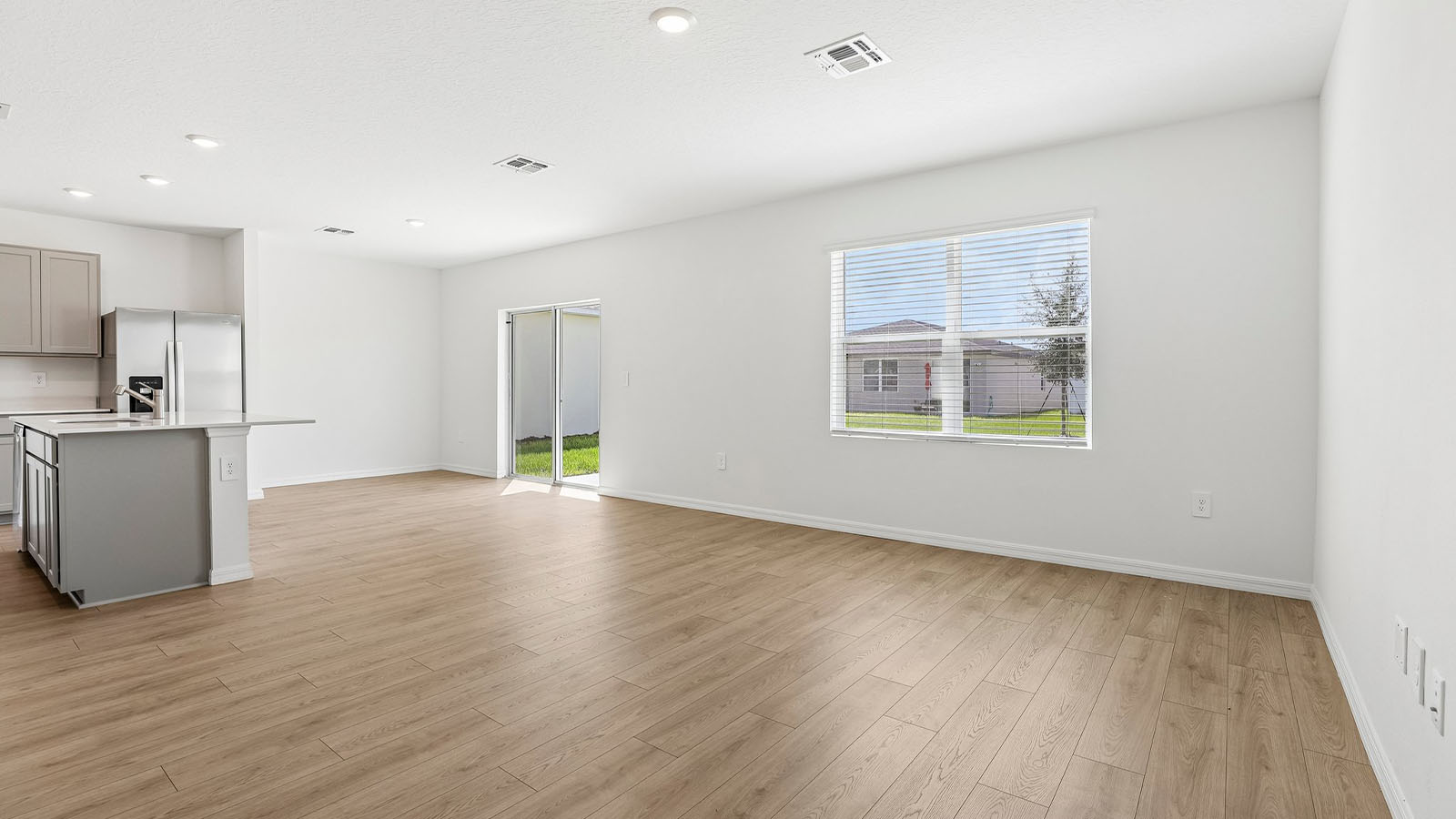 Spacious Living Room with dining area and sliding doors