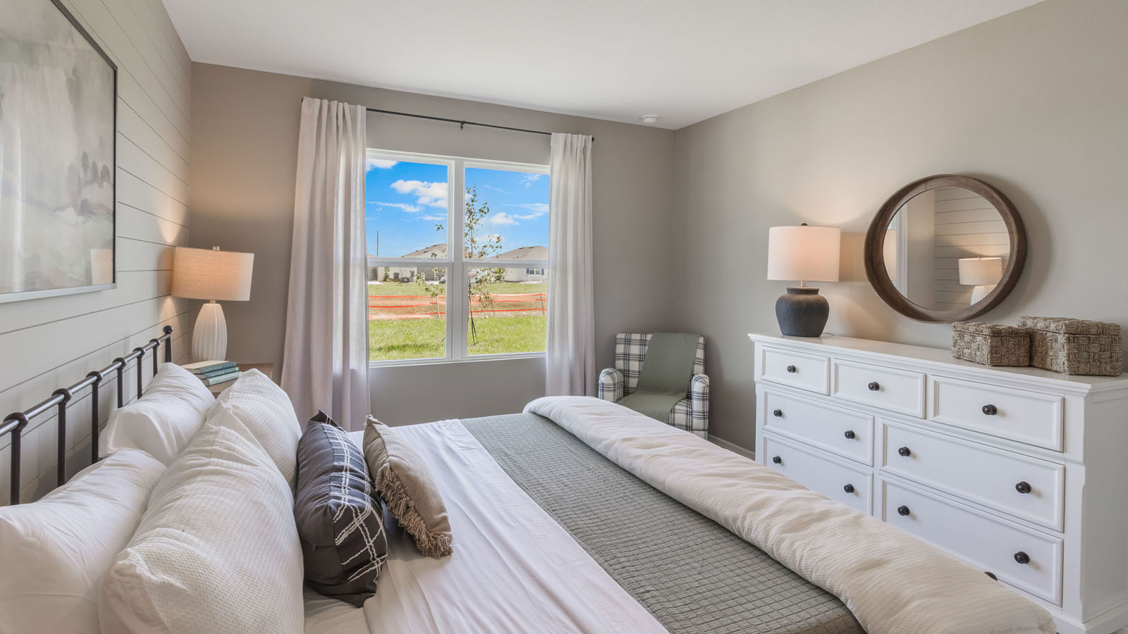 Primary bedroom overlooking the yard