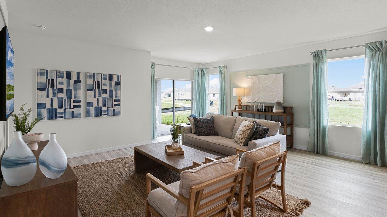 Living room with large windows and patio doors for natural light