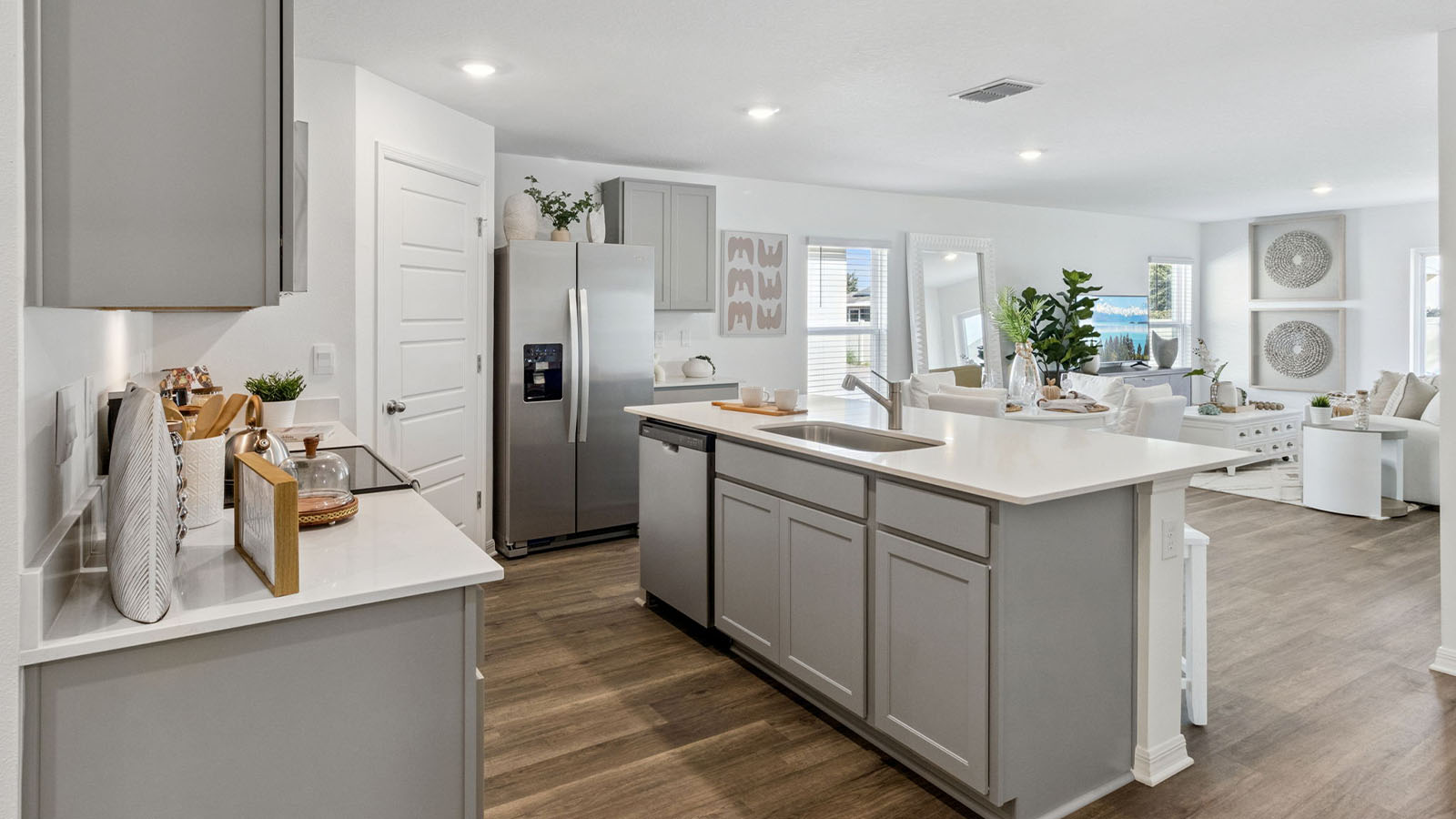 Kitchen with large island with view to the living room
