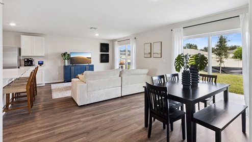 Dining room with Luxury Vinyl Plank Flooring throughout