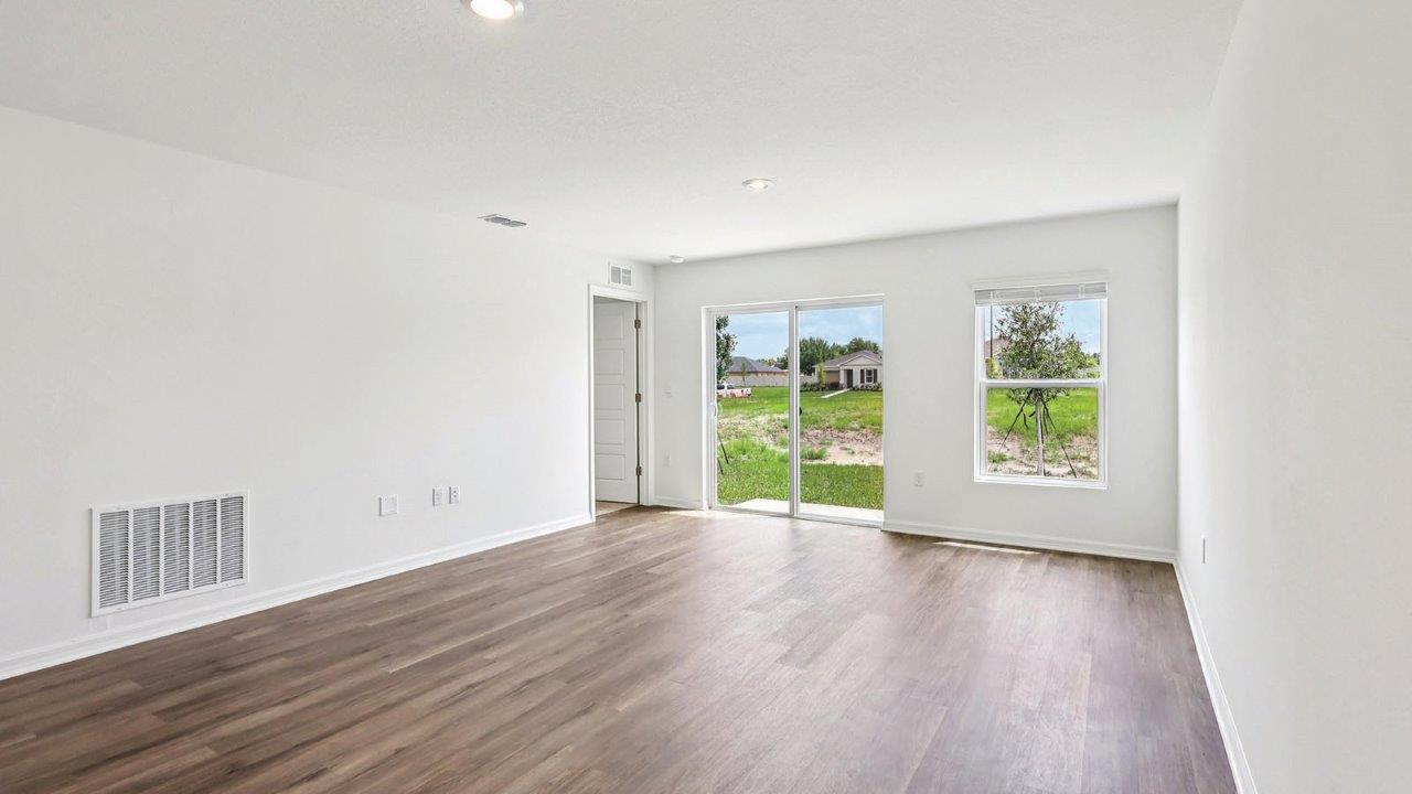 Kitchen with view of the living room
