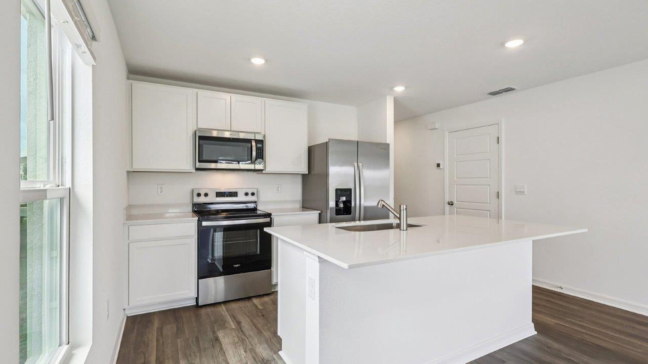 Kitchen with stainless steel appliances