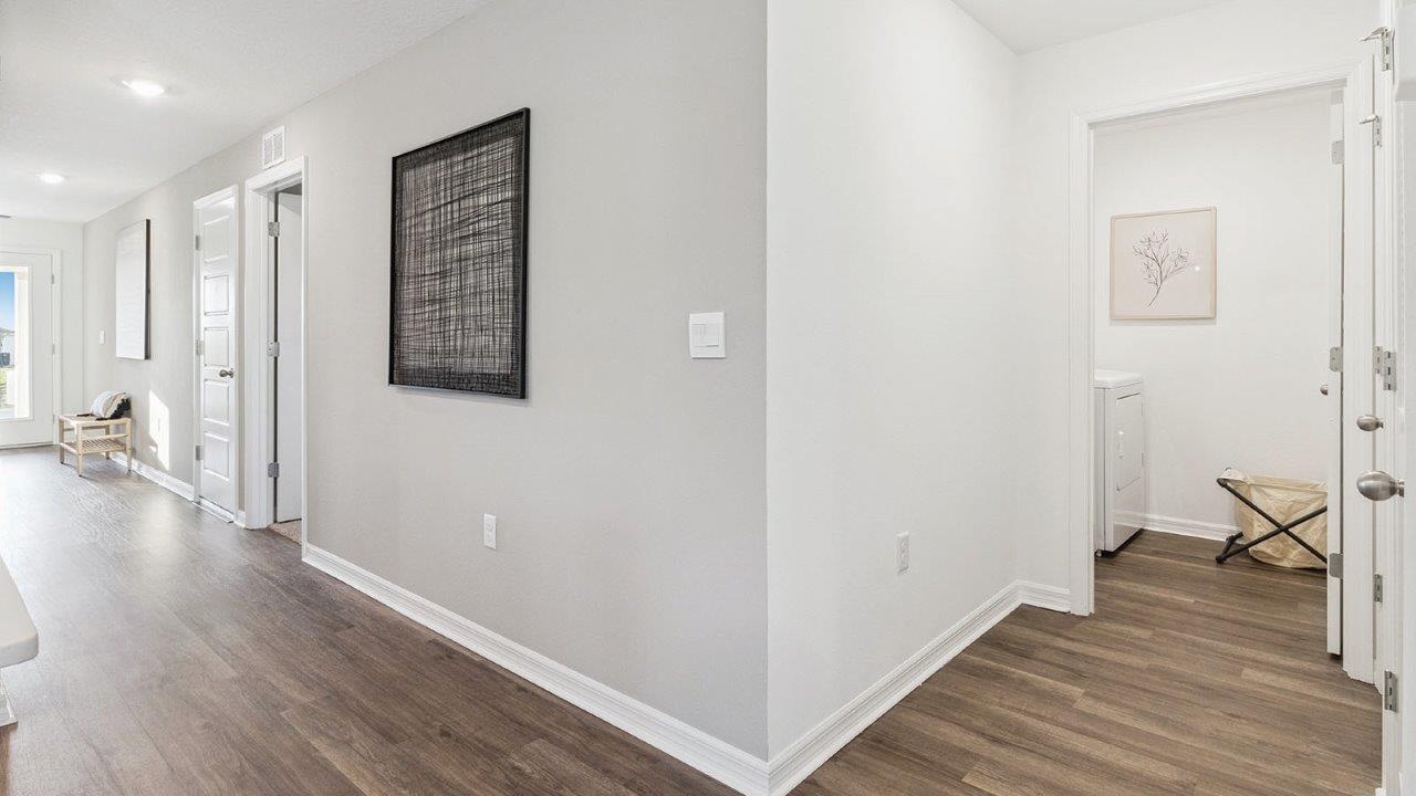 Entry way with entrance to the two rooms