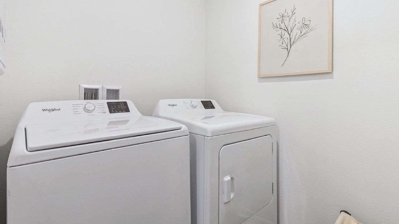 Laundry room with washer and dryer