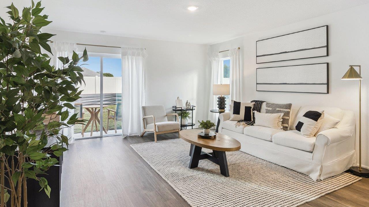 Living room with Luxury Vinyl Plank Flooring throughout