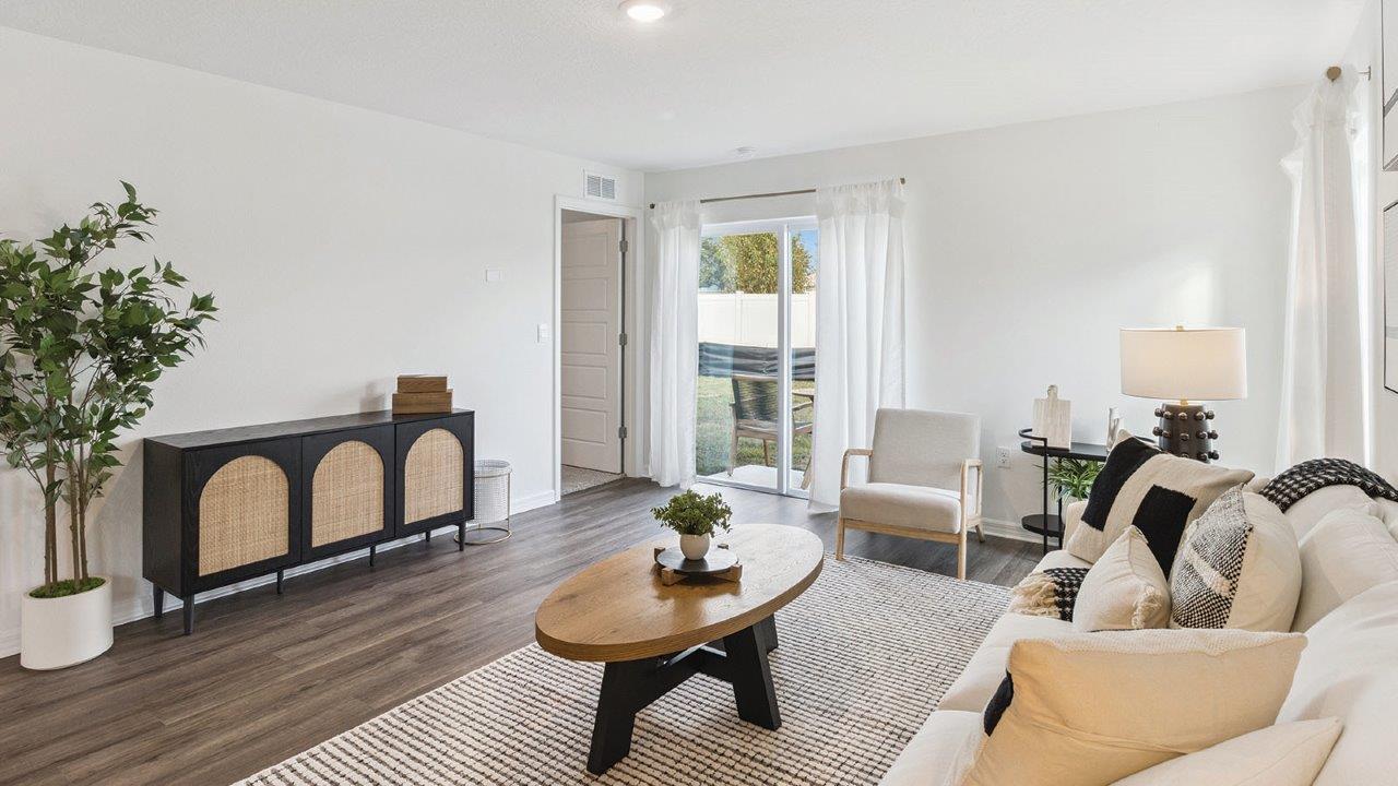 Living room with Luxury Vinyl Plank Flooring throughout