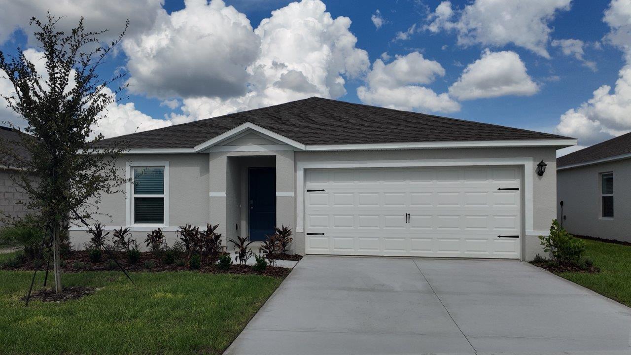 Exterior single family home with two car garage