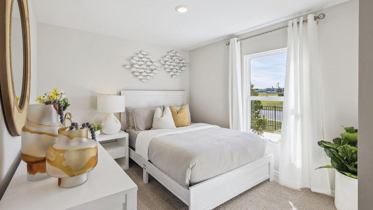 Guest Room with dresser and bed