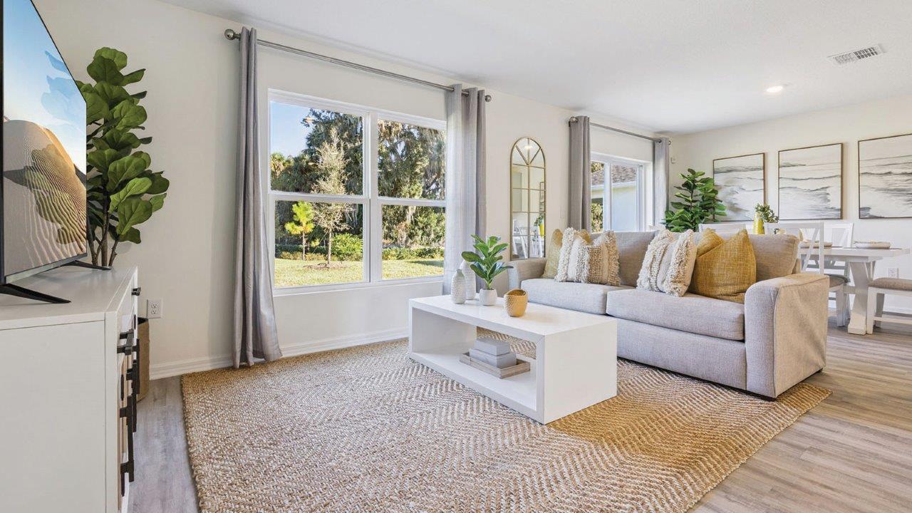 Living Room with view into the Primary Bedroom