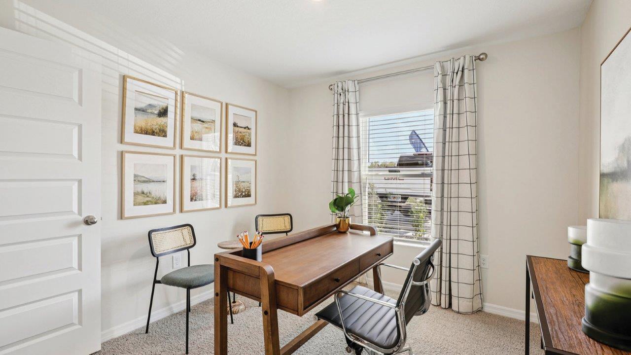 Office with desk and chairs