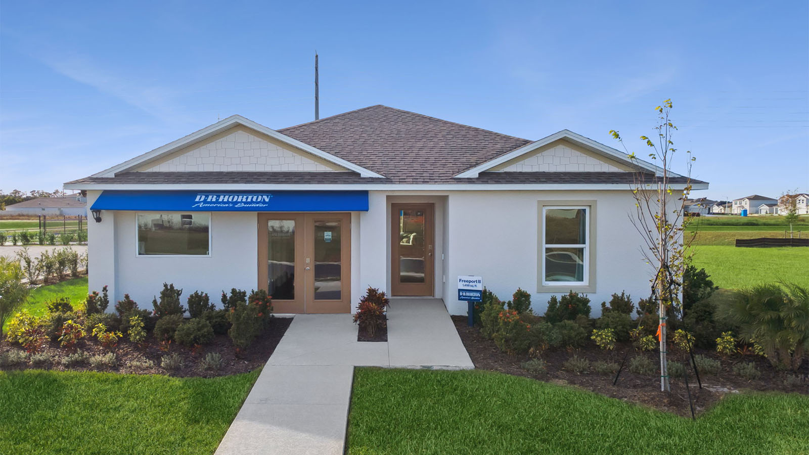 Exterior single family home with two car garage