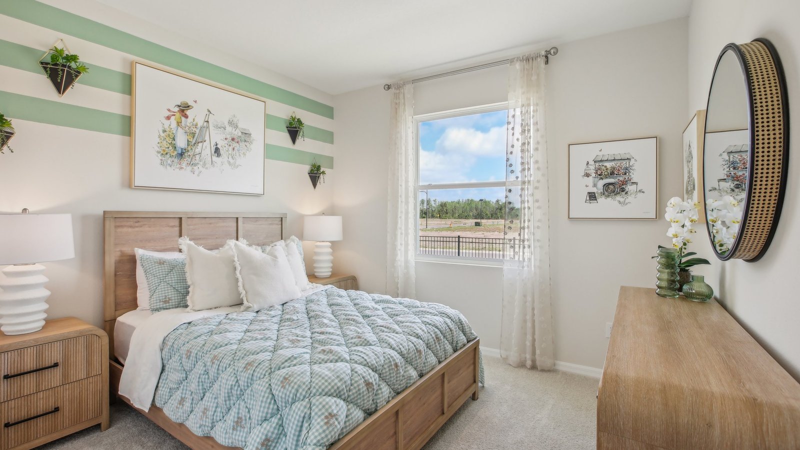 Guest bedroom with bed, nightstands and a roomy closet for storage.