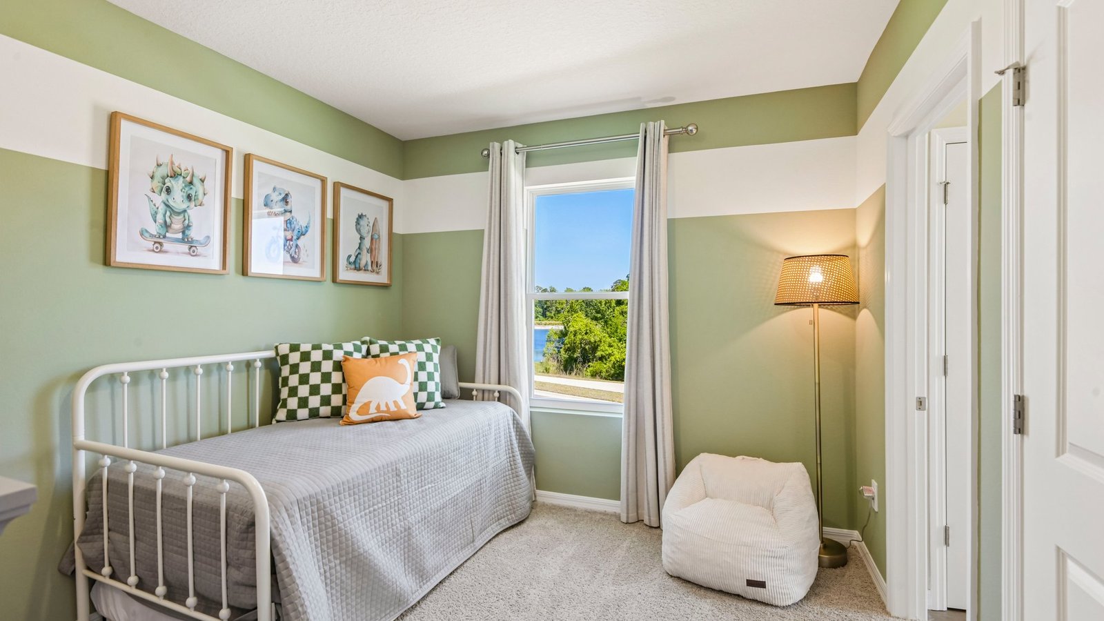 Guest bedroom with bed, nightstands and a roomy closet for storage.