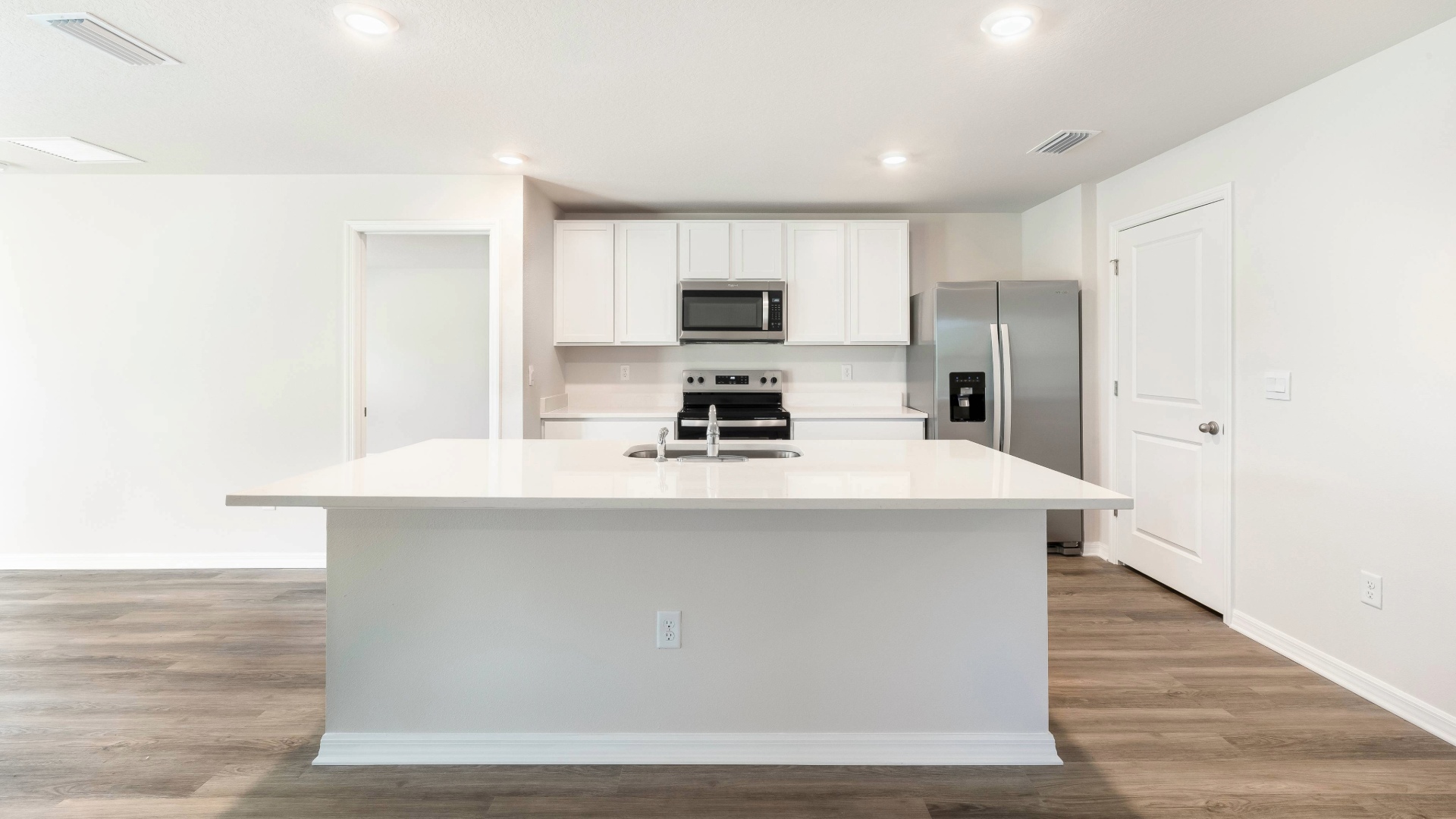 Kitchen in the Aria floorplan at Rye Crossing by D.R. Horton in Parrish Florida