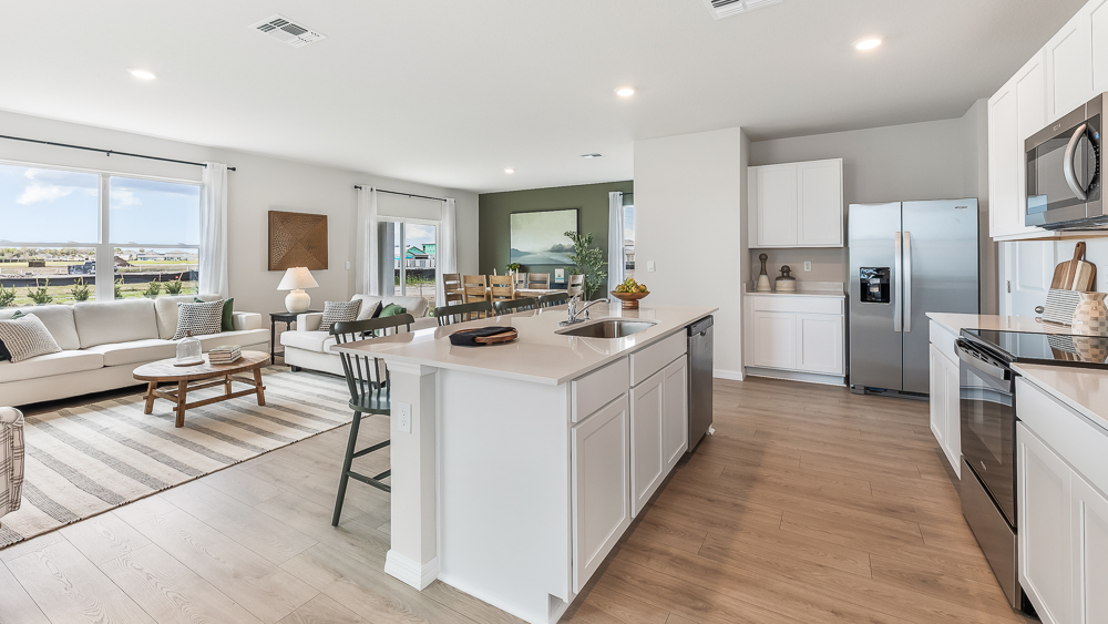 Kitchen in the Elston floorplan at Rye Crossing by D.R. Horton in Parrish Florida
