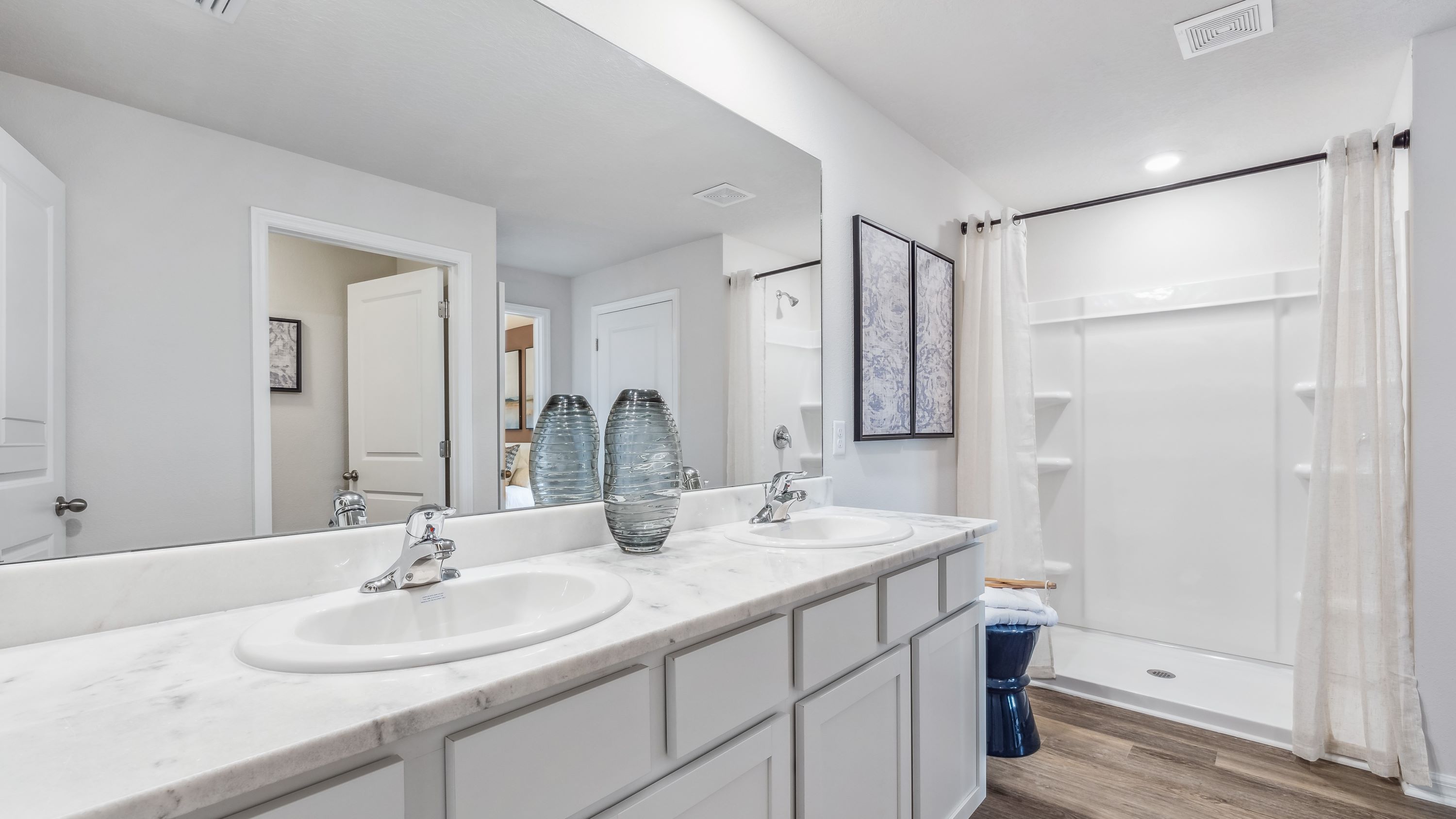 Photo of master bathroom with walk in shower
