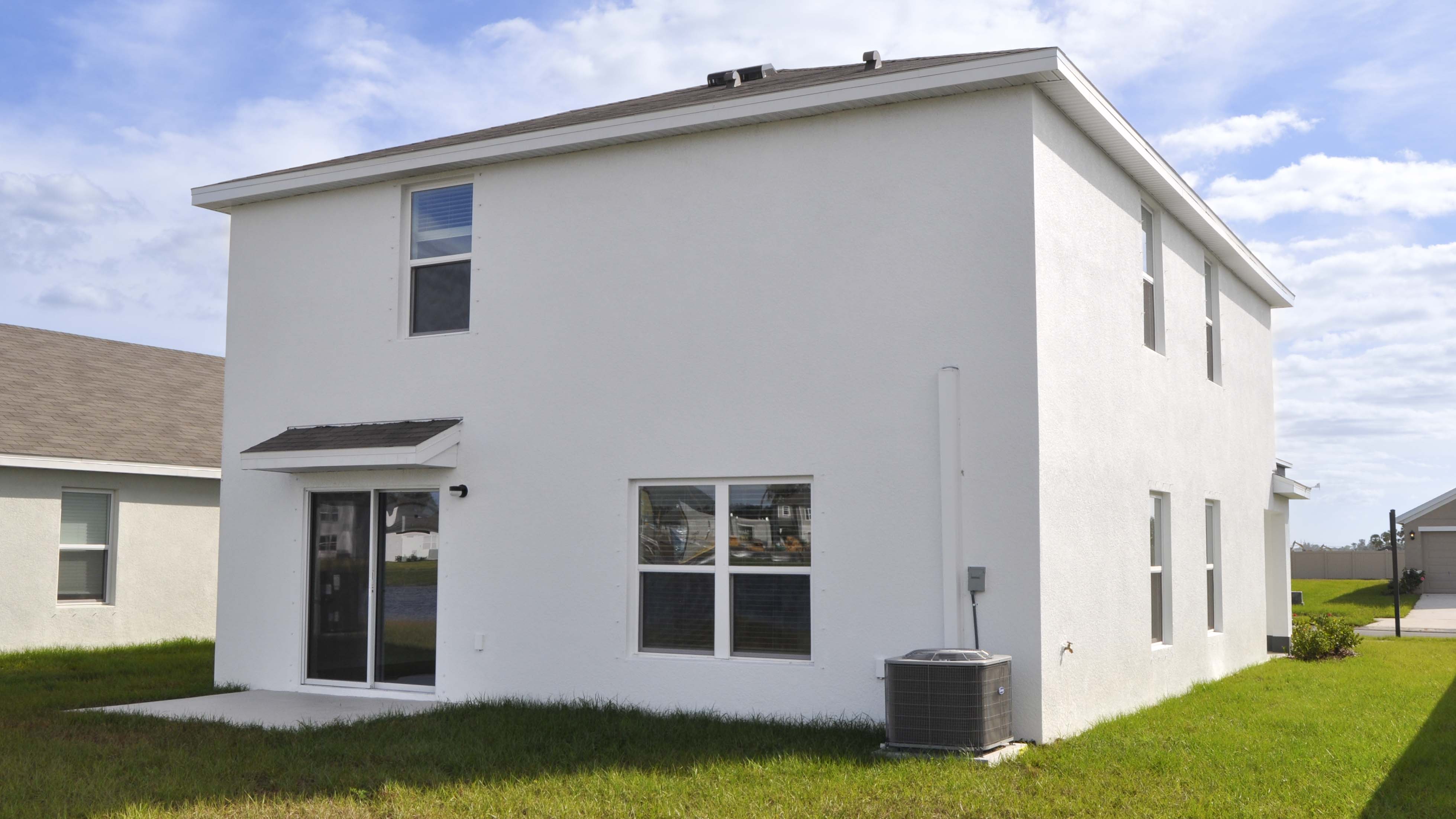 exterior photo showing the rear and side of the elston floorplan