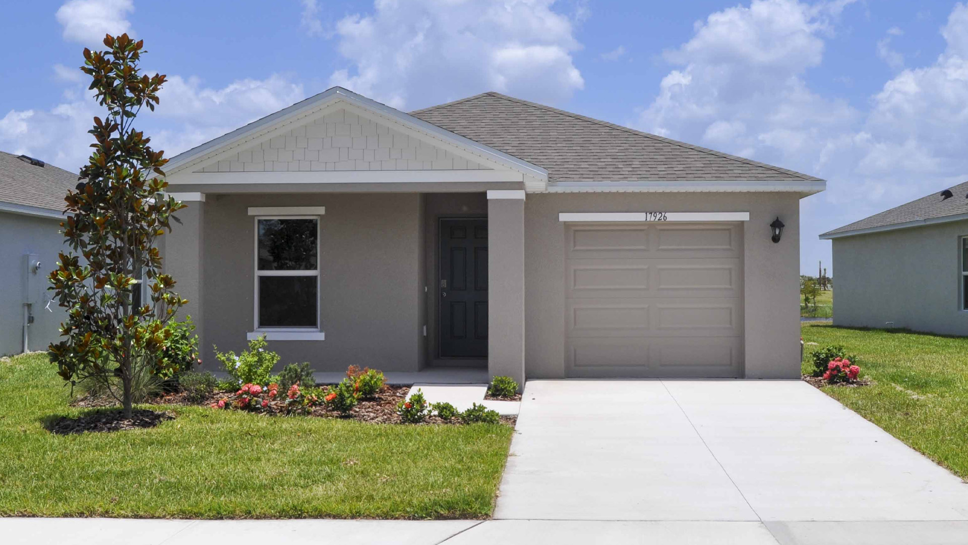 Alford floor plan exterior of a single-story single family home with a two car garage.