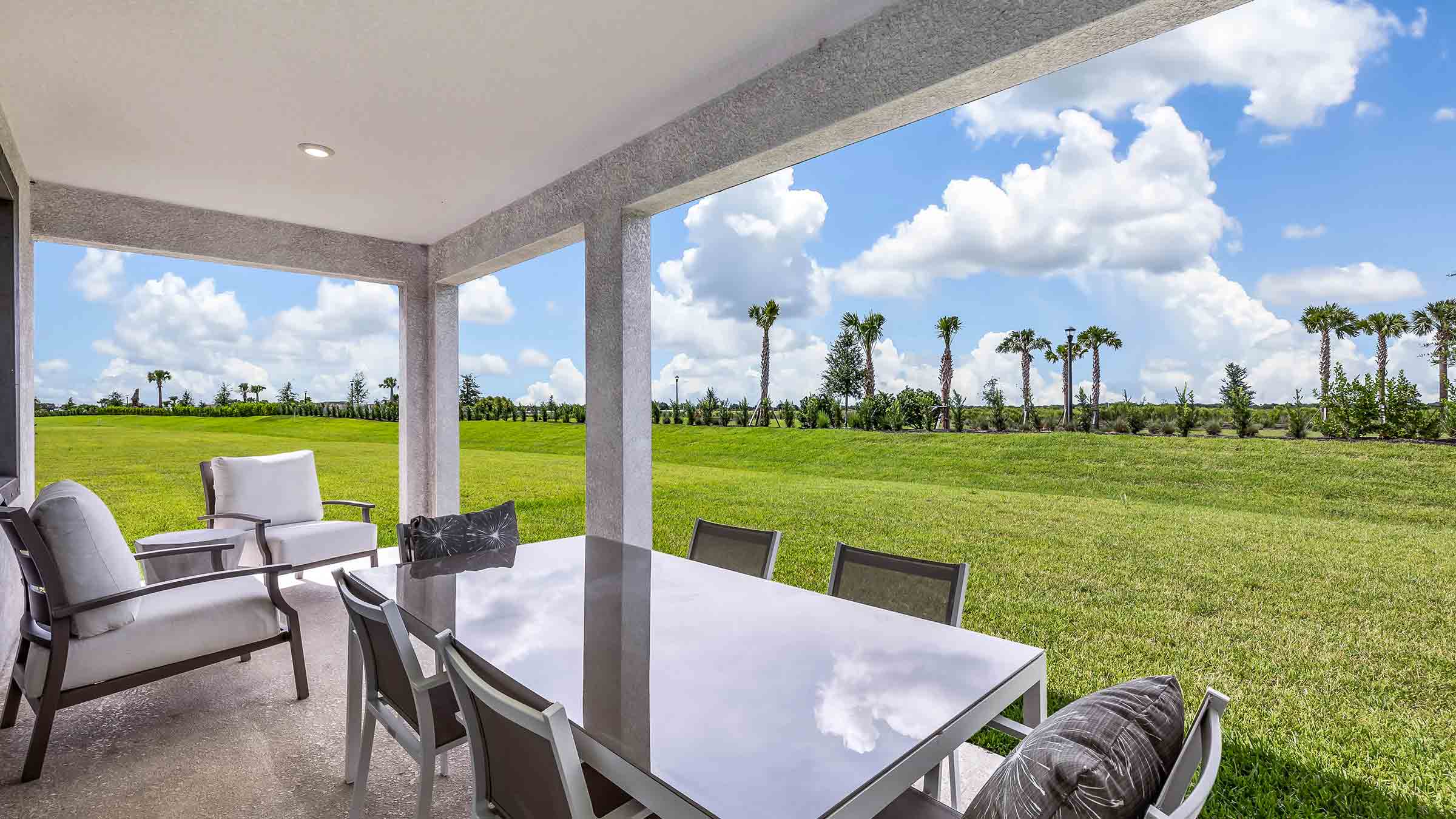 Covered patio in the Lantana floorplan at Legacy Preserve by D.R. Horton in Parrish Florida