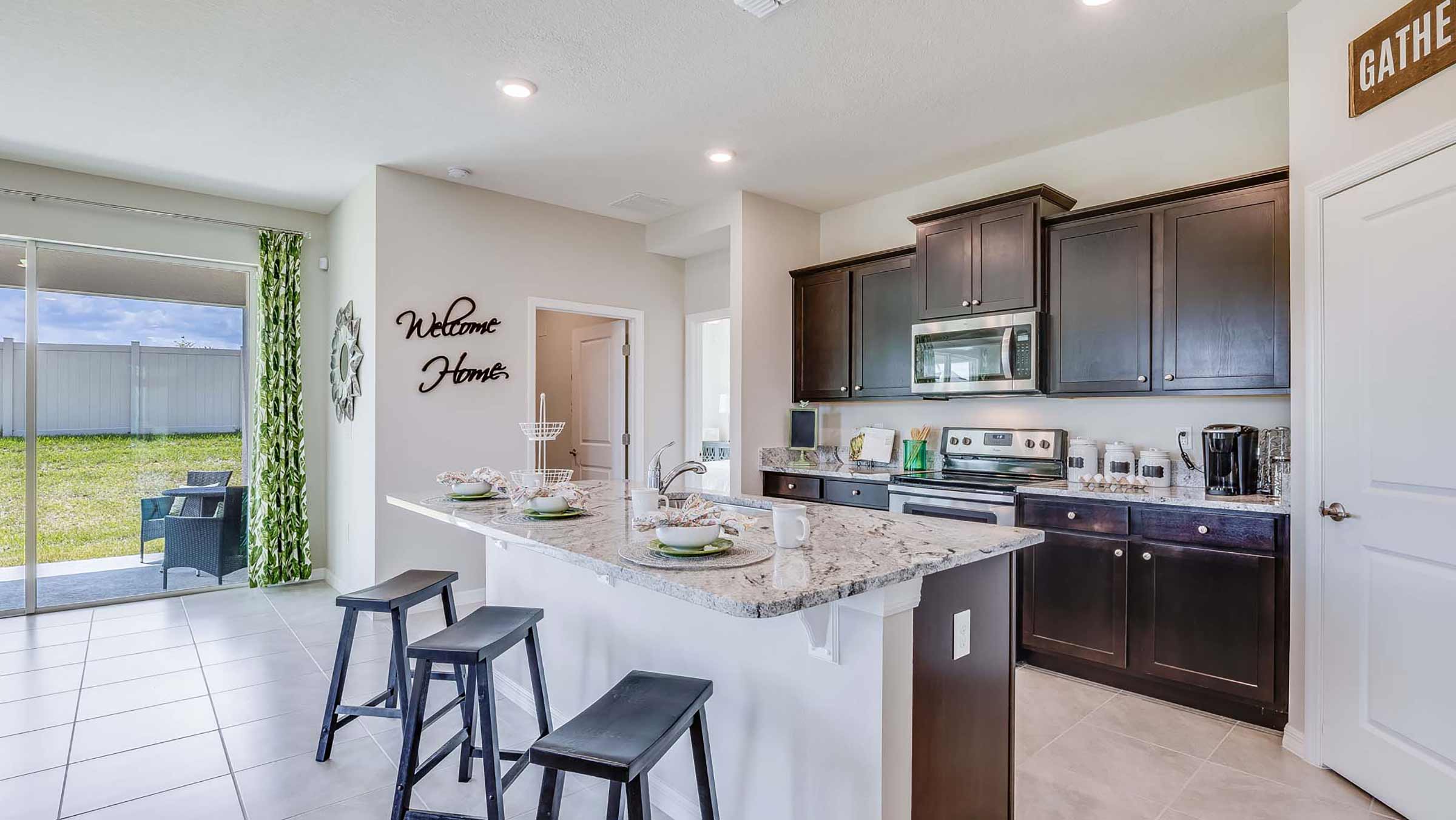 Kitchen in the Clifton floorplan at Legacy Preserve by D.R. Horton in Parrish Florida