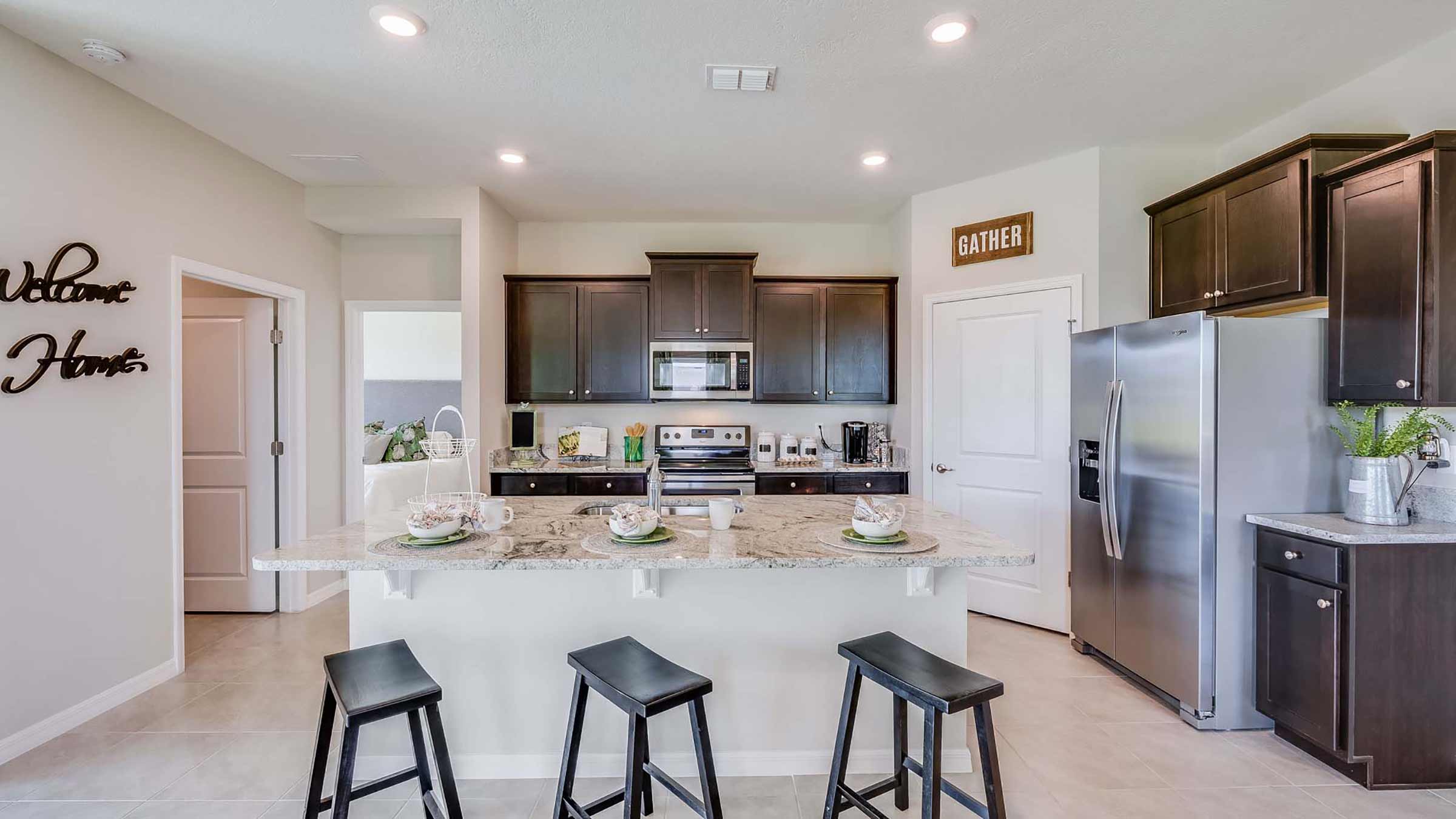 Kitchen in the Clifton floorplan at Legacy Preserve by D.R. Horton in Parrish Florida