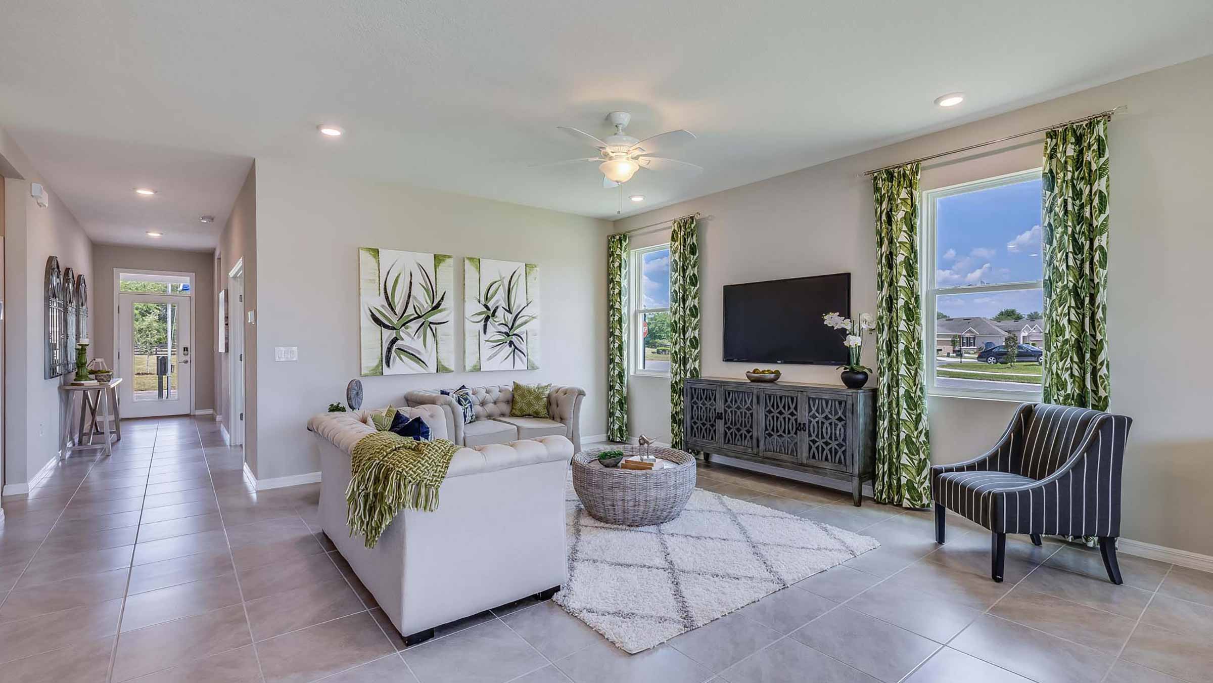 Great room in the Clifton floorplan at Legacy Preserve by D.R. Horton in Parrish Florida