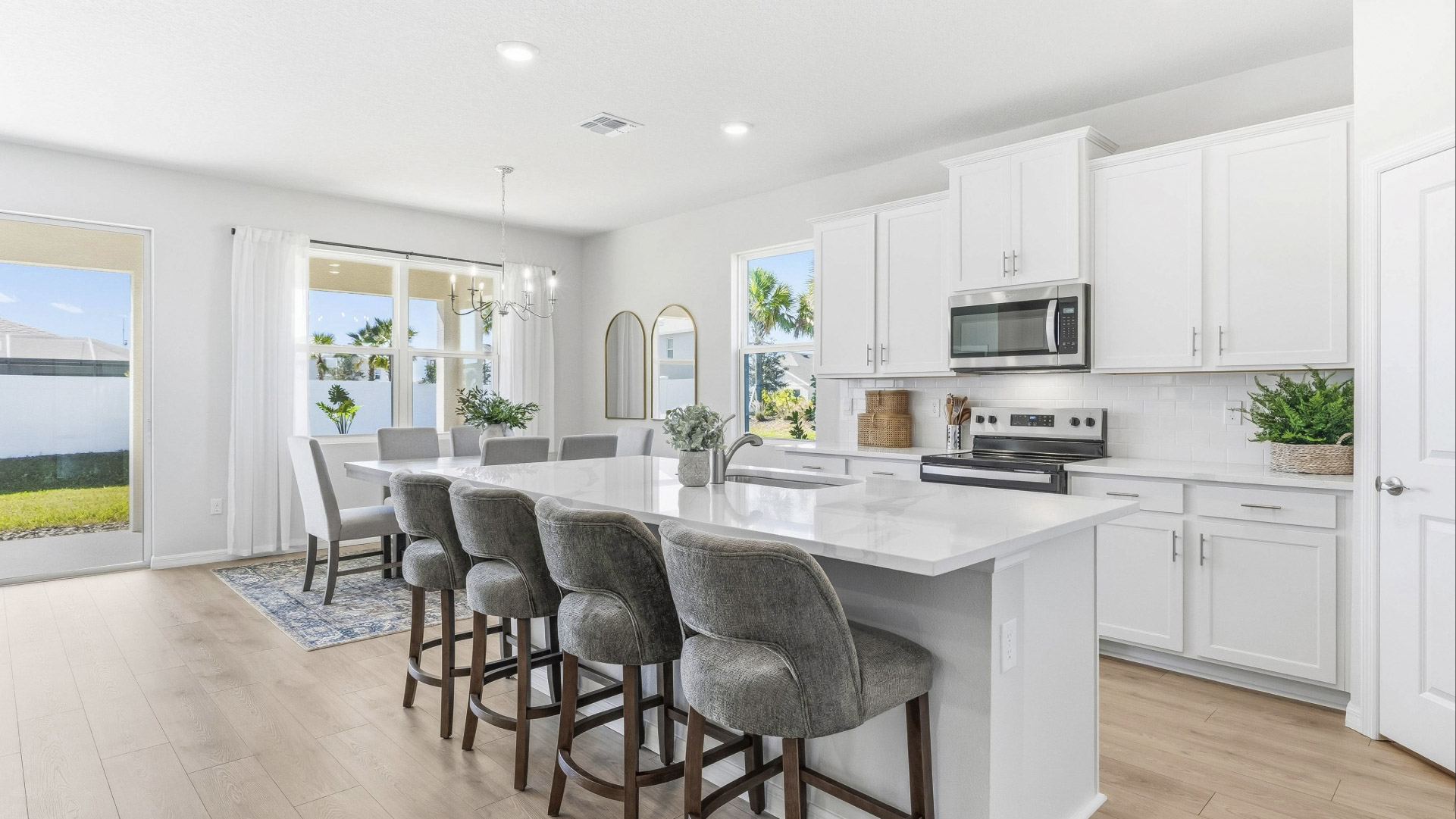 Kitchen in the Delray floorplan at Legacy Preserve by D.R. Horton in Parrish Florida