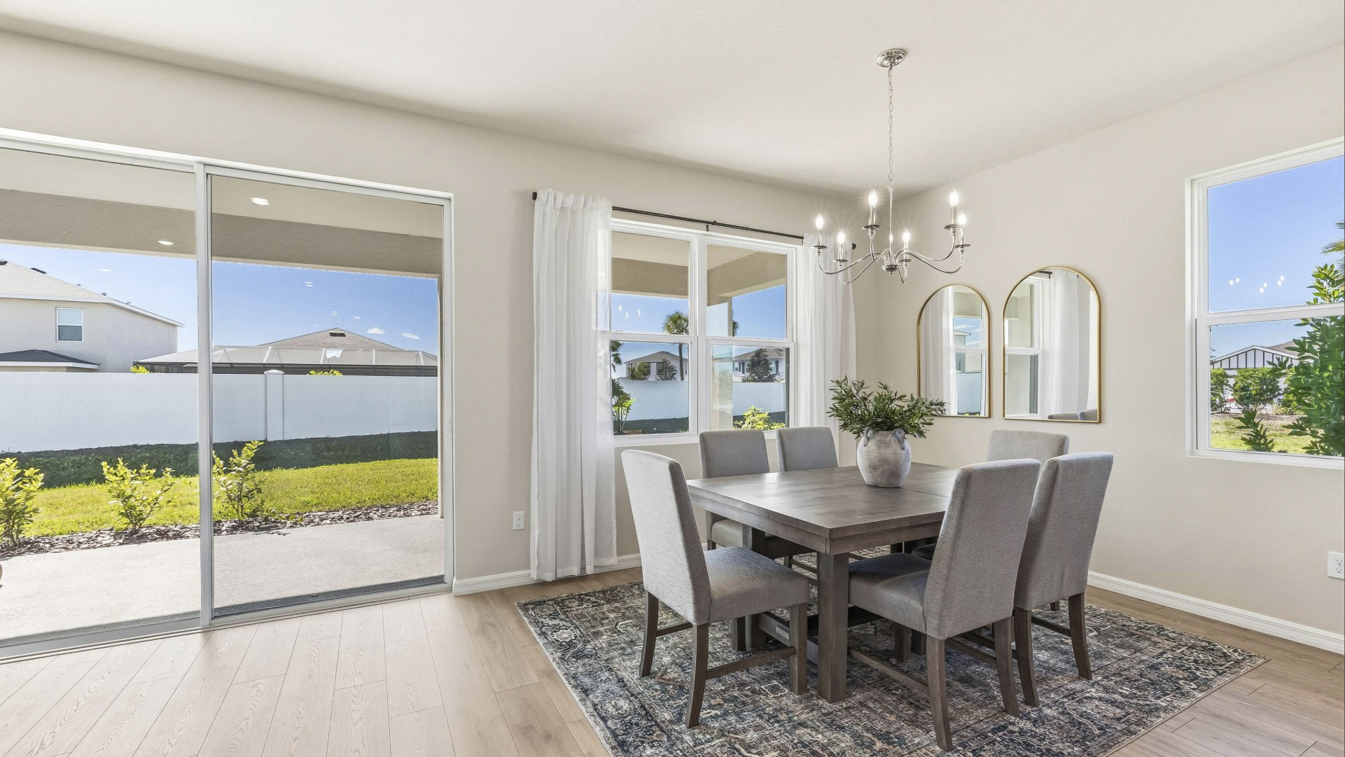 Dining room in the Delray floorplan at Legacy Preserve by D.R. Horton in Parrish Florida