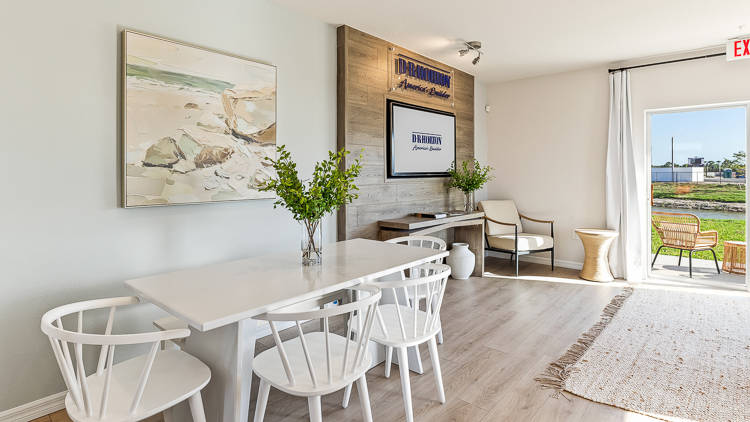 Dining room in the Pearson floorplan at Seaire by D.R. Horton in Parrish Florida