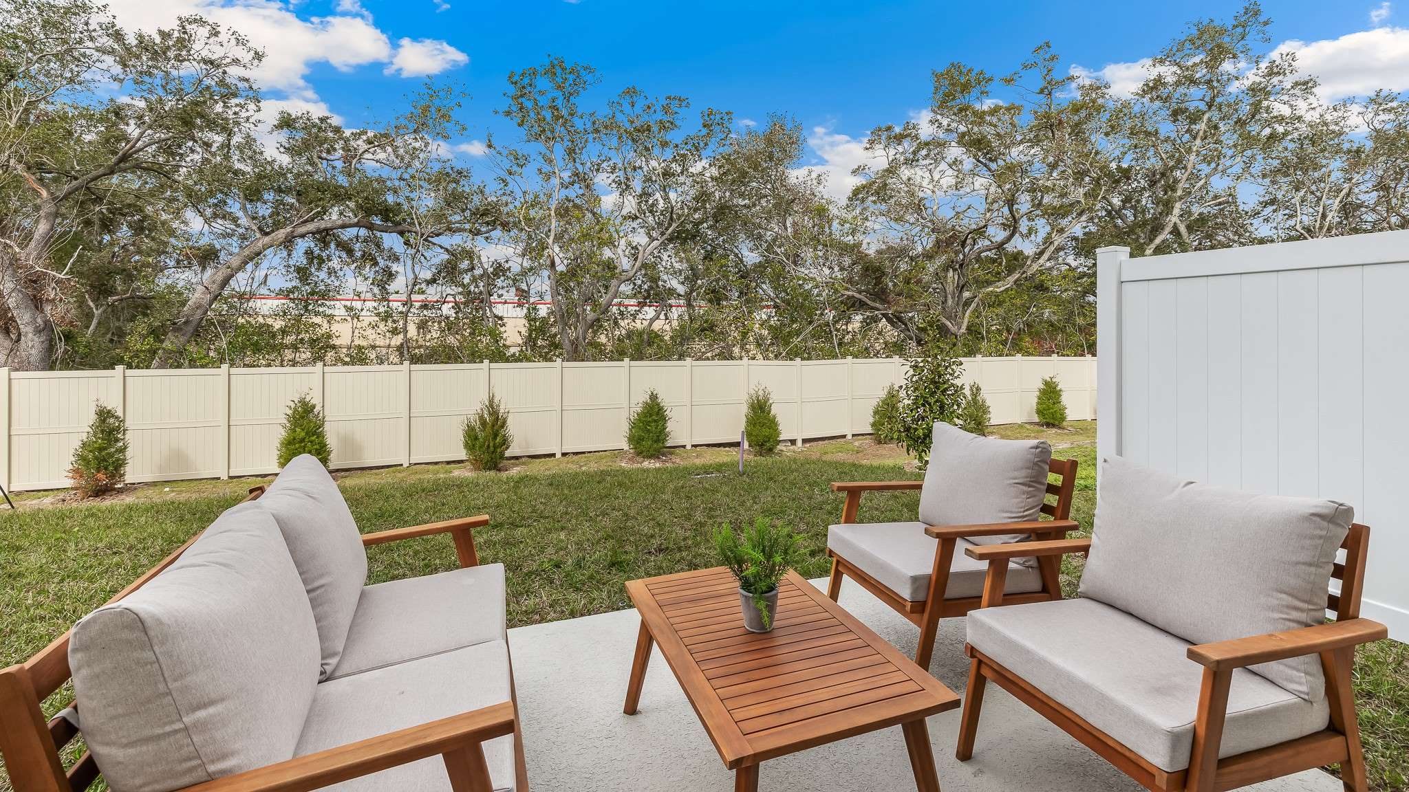Covered patio in the Pearson floorplan at Seaire by D.R. Horton in Parrish Florida