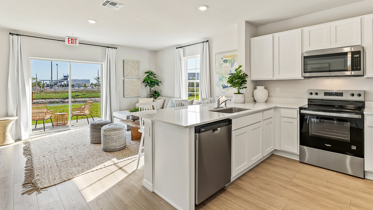 Kitchen in the Pearson floorplan at Seaire by D.R. Horton in Parrish Florida