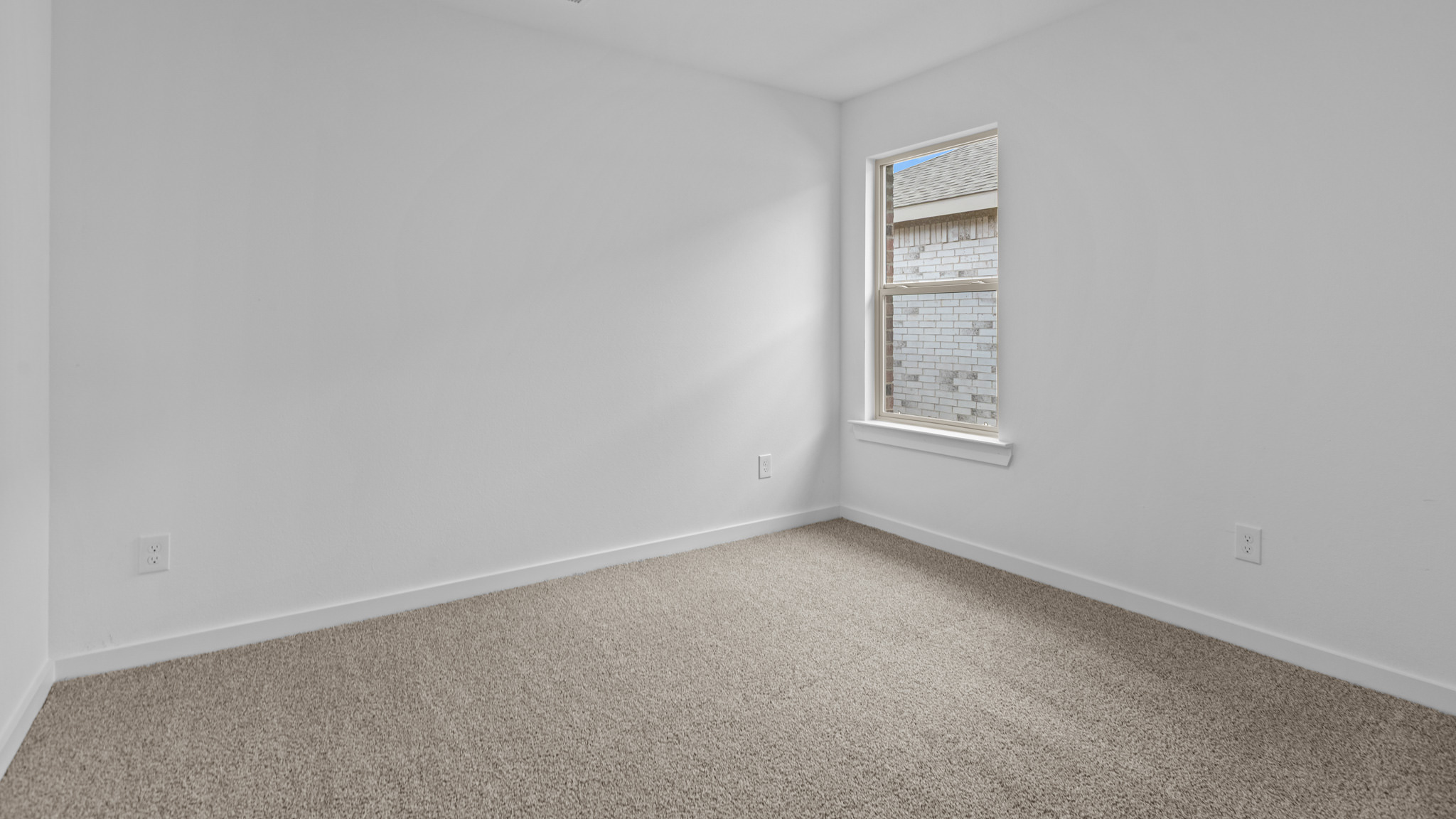 Guest bedroom 3 with plush carpet floors and spacious closet