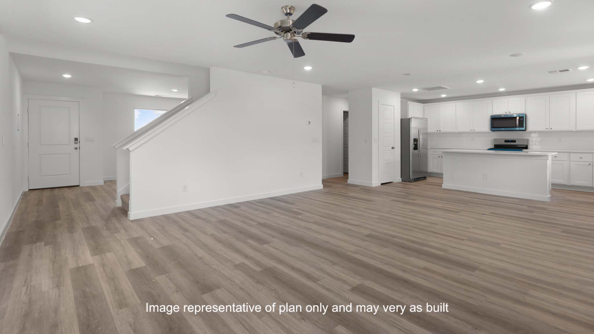 Open concept kitchen, living, family, and dining room space