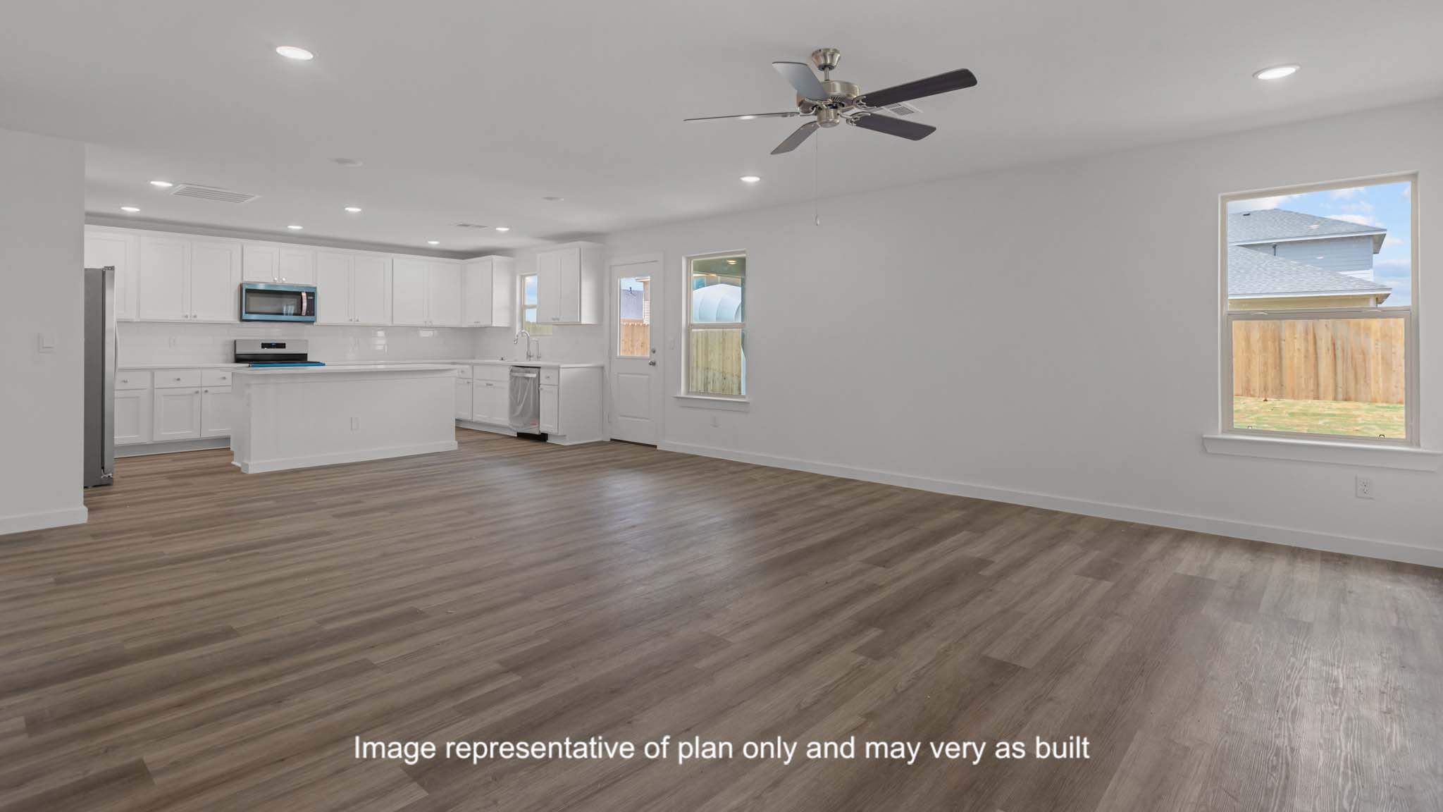 Open living and family room area with ample natural light