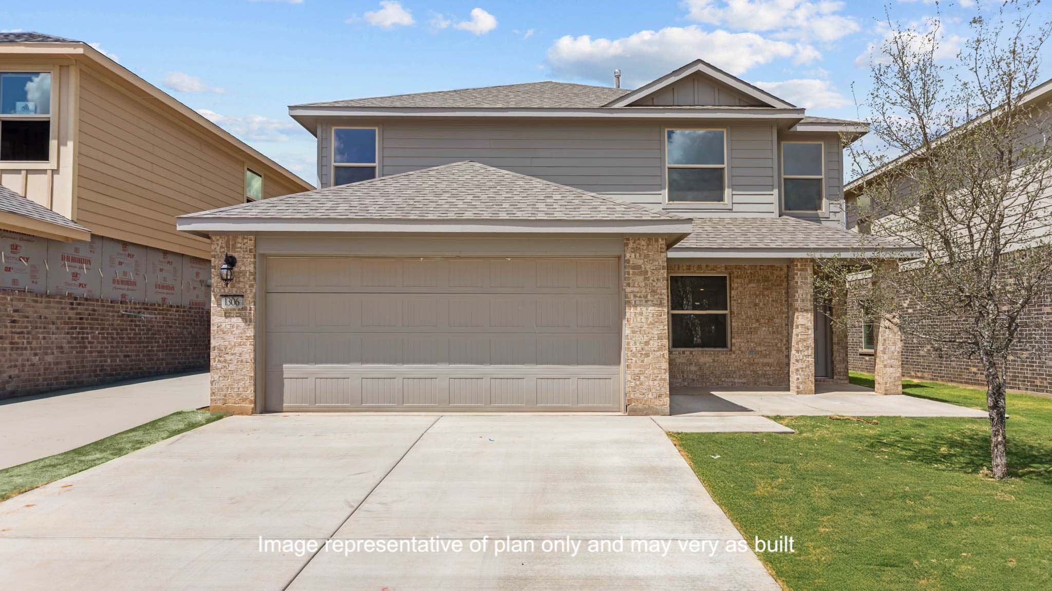 Exterior of two story modern brick home