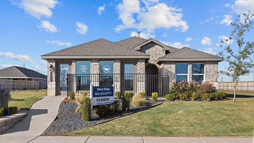 Terra Vista Model Home single story with brick, stone and covered patio