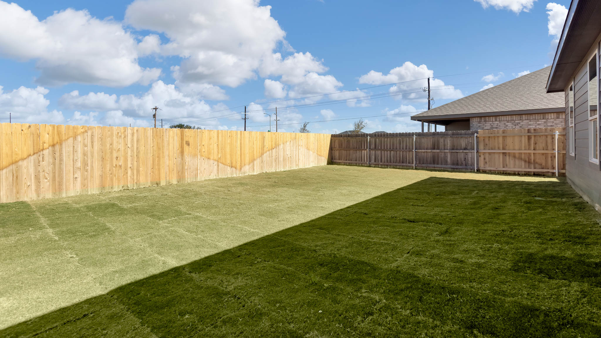 Private spacious fenced-in backyard