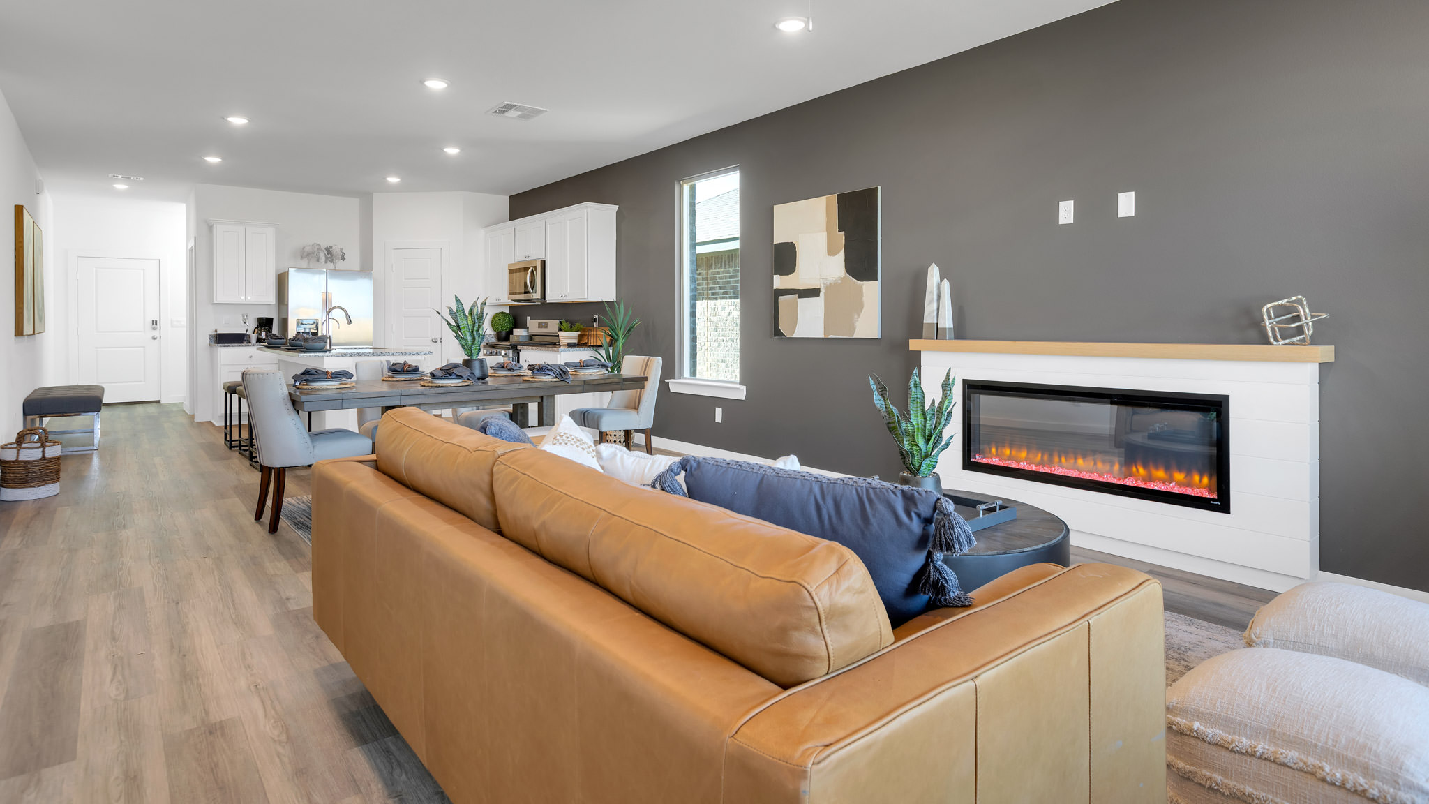 Open living and family room area with ample natural light