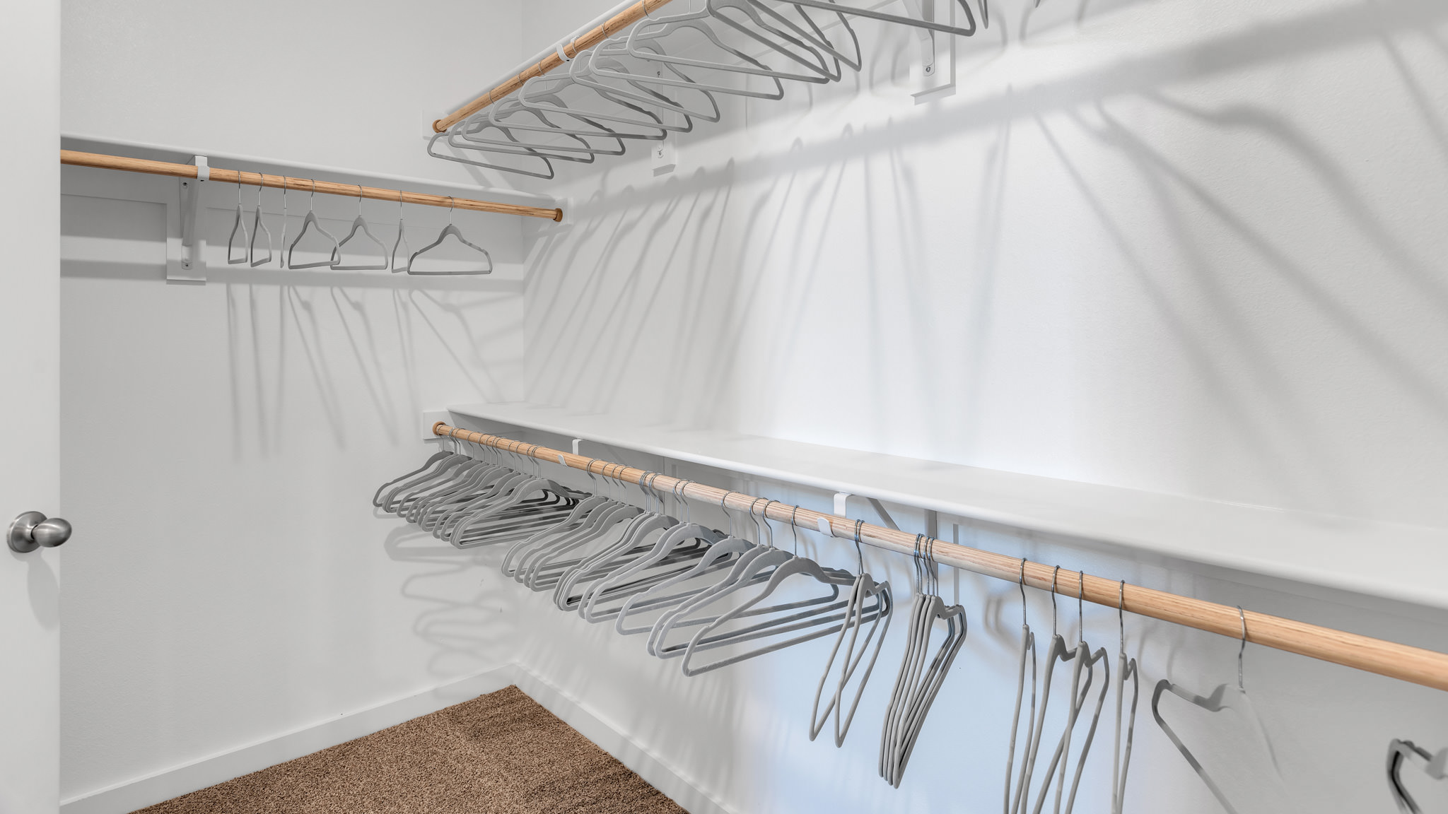 Primary walk-in closet with extra storage space