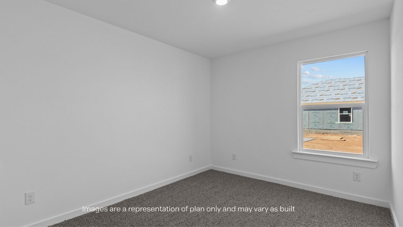bedroom with side window and spacious closet