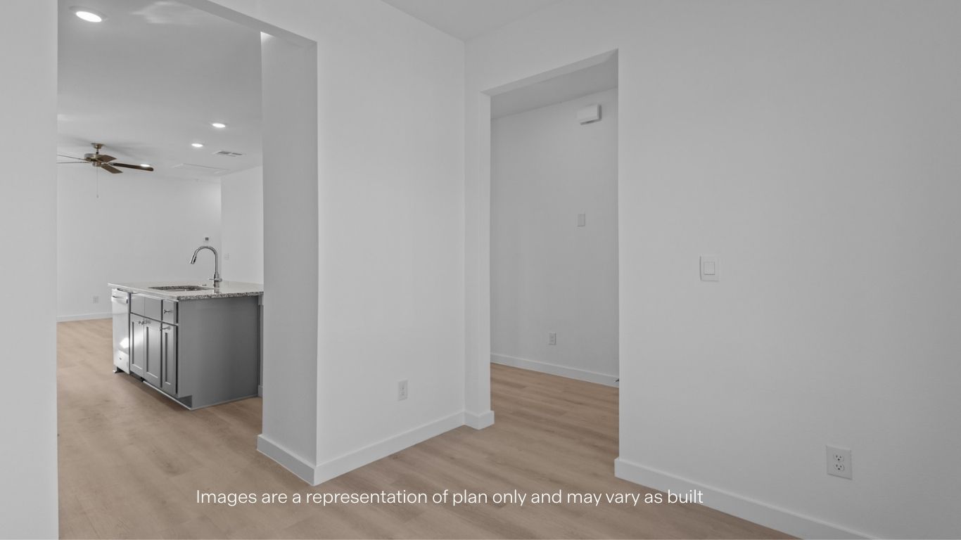 Cozy dining nook space next to kitchen with front window