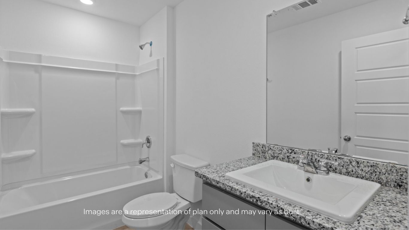 Guest bathroom with built in vanity and combination bathtub shower