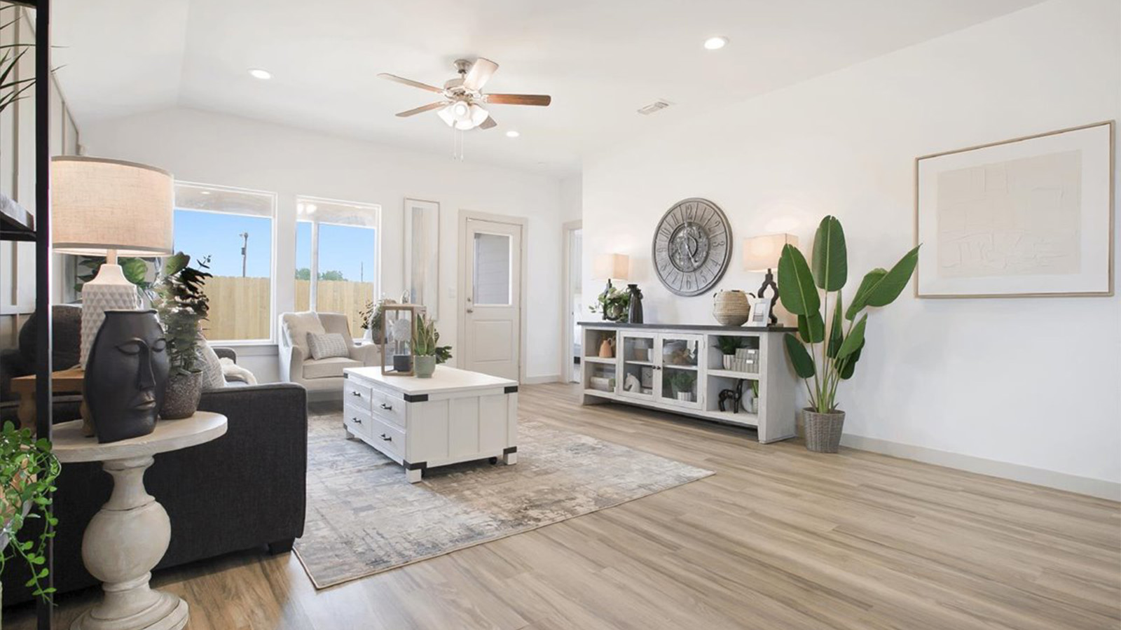 Open family room with vinyl plank flooring