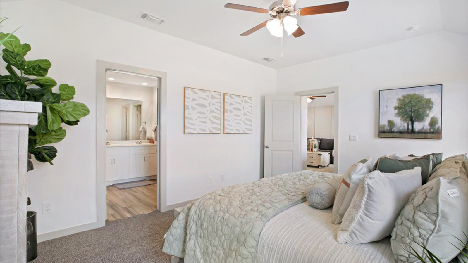 Primary bedroom with attached bathroom