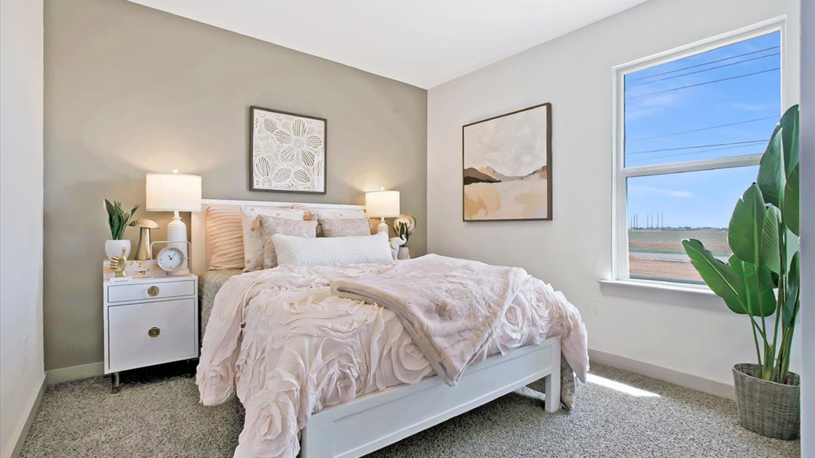 Bedroom 3 with plush carpet, spacious closet and window