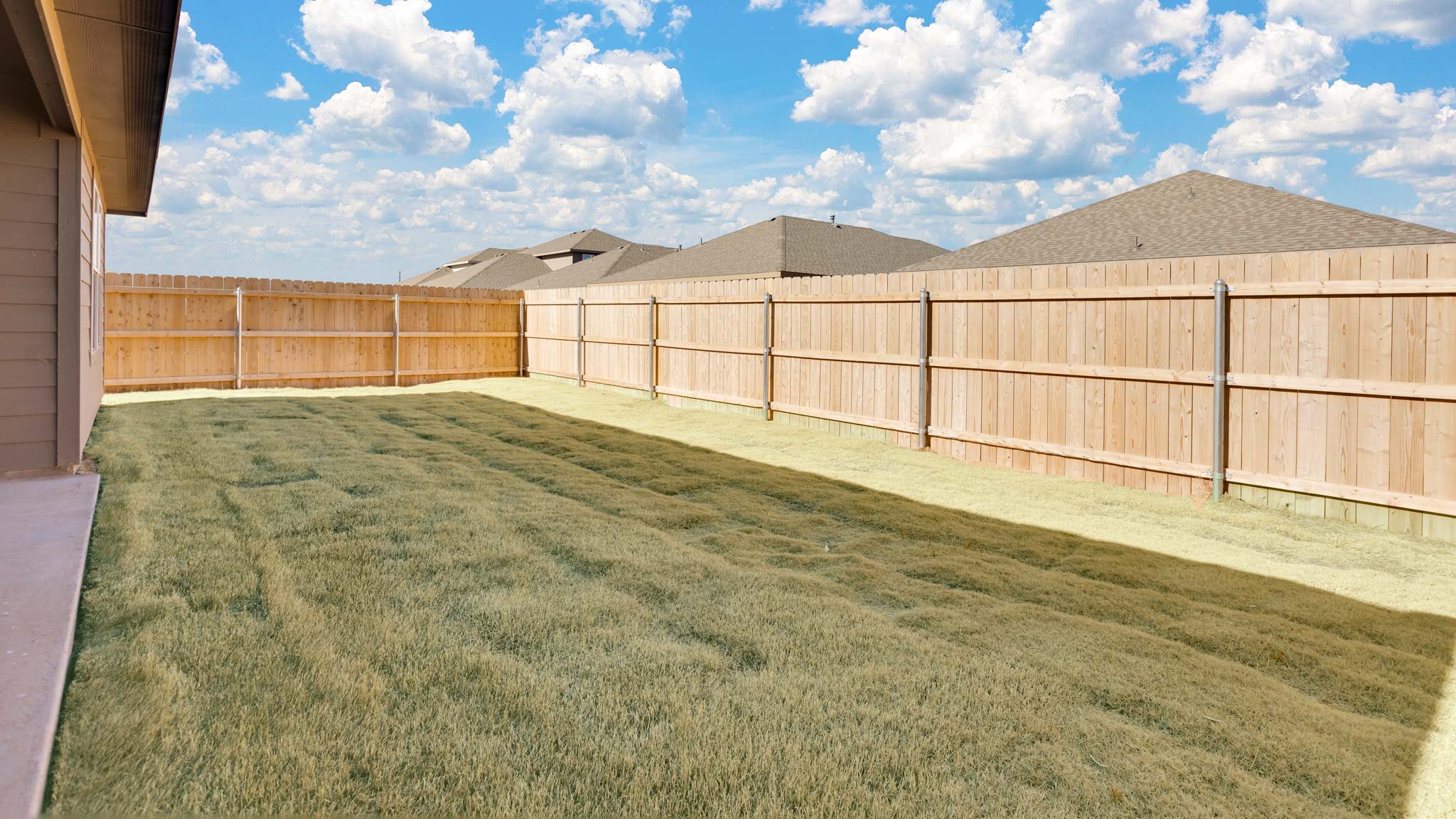 Private fenced spacious backyard